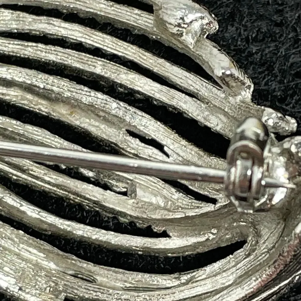 BSK Vintage Brooch Silver Tone Metal Openwork Ring With Textured Rope Spray